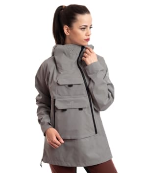 woman wearing grey 3 layer ski anorak 1